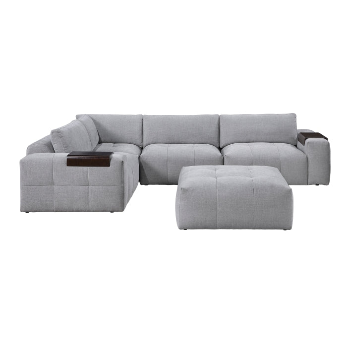 MAZ Tidal 5-piece modular sectional sofa with matching ottoman in grey fabric, shown from the side with no background.