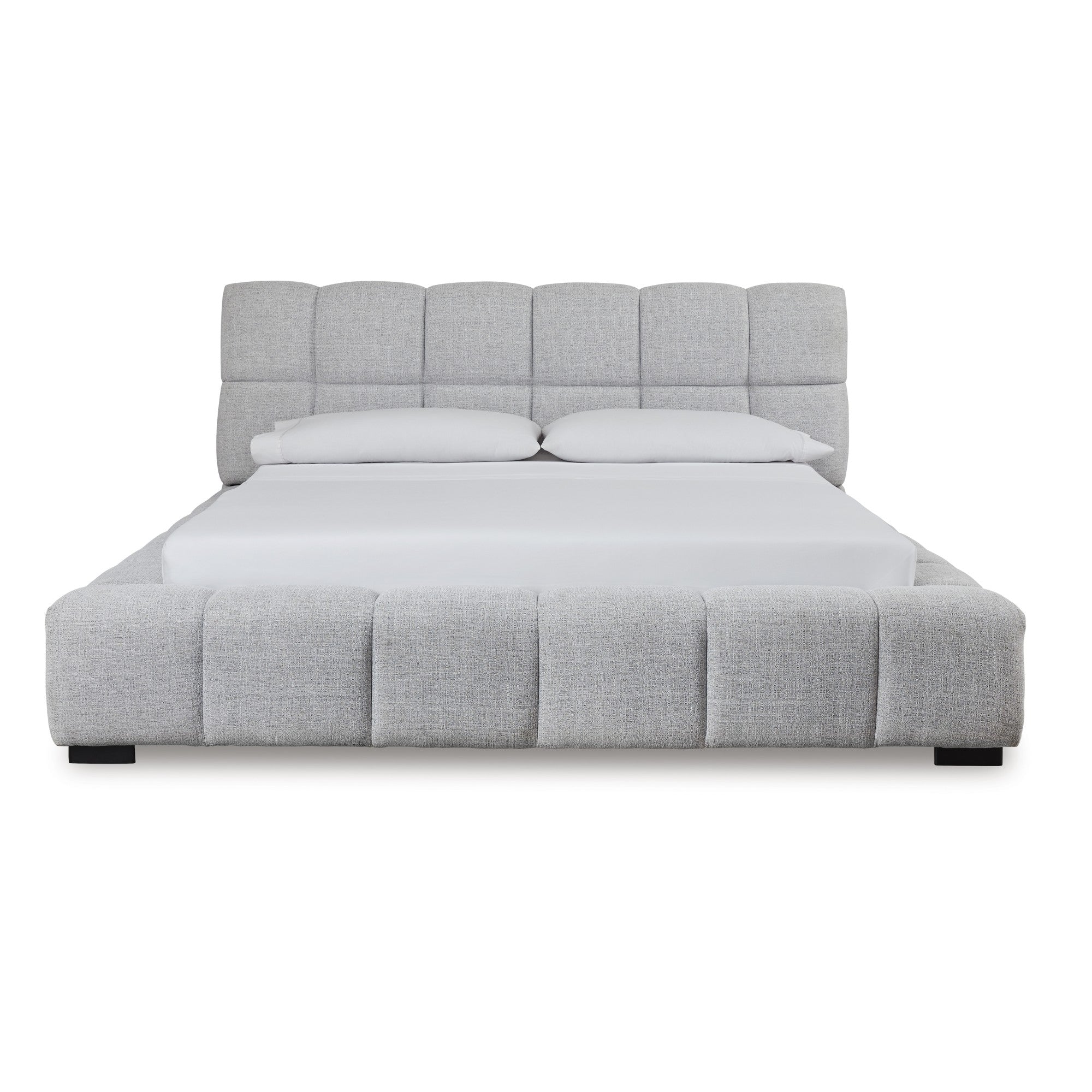 Light gray upholstered Ashley bed from the Grendusk collection, showcasing a stylish and comfortable bedroom furniture piece.