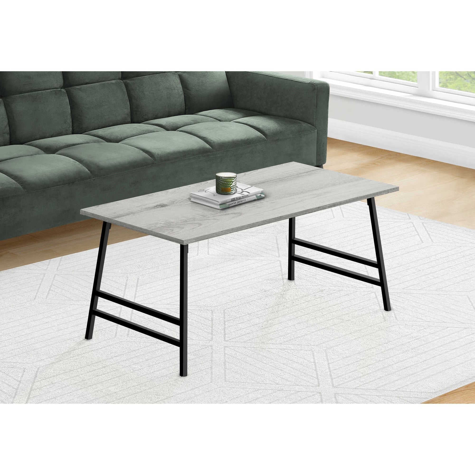 Grey Axon coffee table by Monarch Specialties with a modern design, featuring a sleek rectangular surface and sturdy legs.