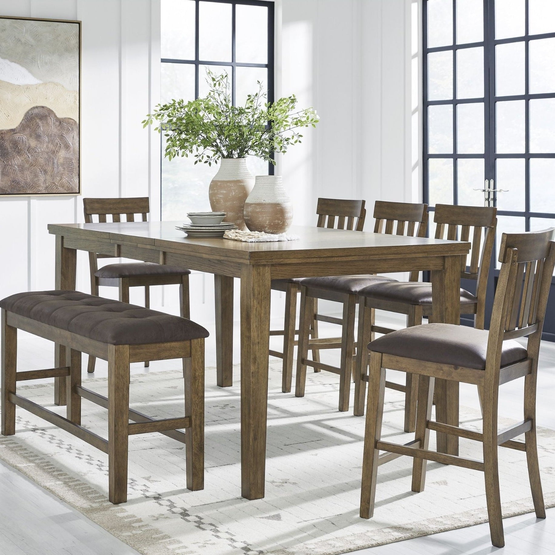 Signature Ashley Urbinforte 6-piece counter height dining set with light brown wood finish, includes table and matching chairs.