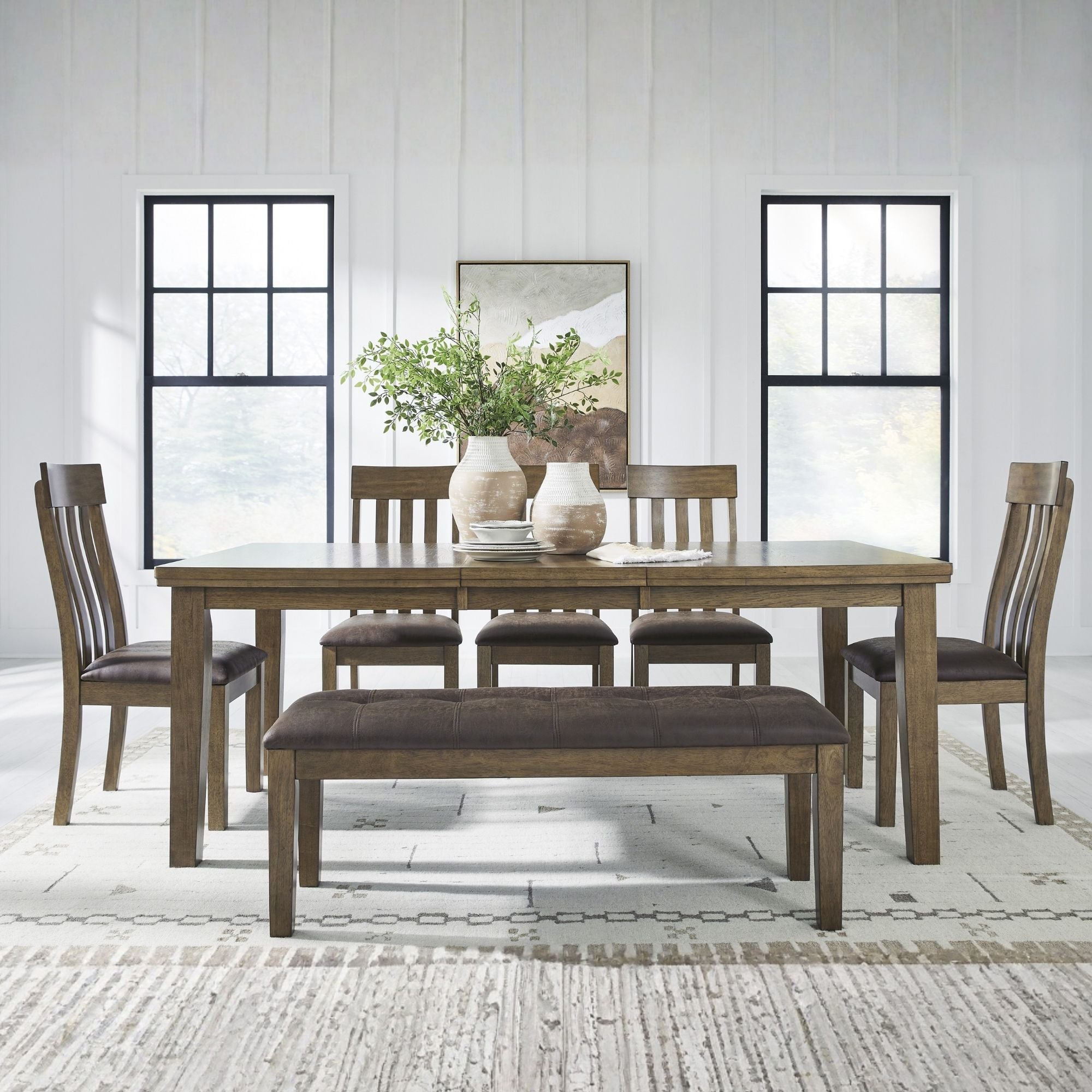 Light brown 6-piece Ashley dining room set with table and matching chairs, perfect for modern home dining spaces.