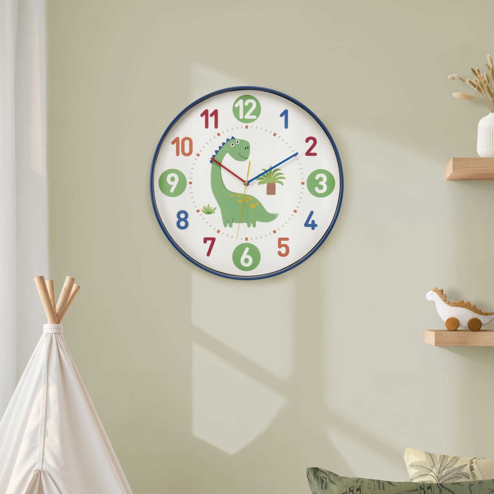 Colorful 18-inch Dinosaur wall clock for kids by Monarch Specialties, featuring playful dinosaur illustrations and easy-to-read numbers.