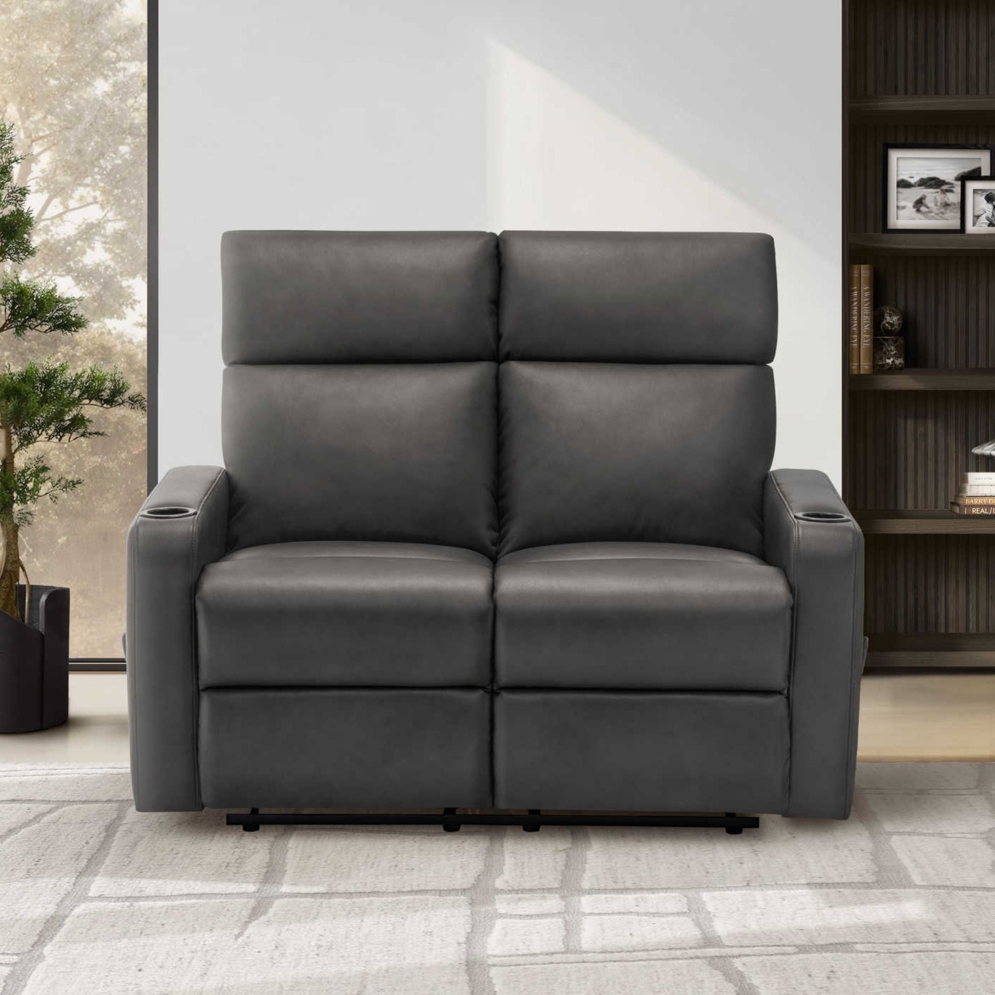 Dark grey Monarch Specialties Arden reclining loveseat with built-in cupholders, featuring plush cushions and modern design.