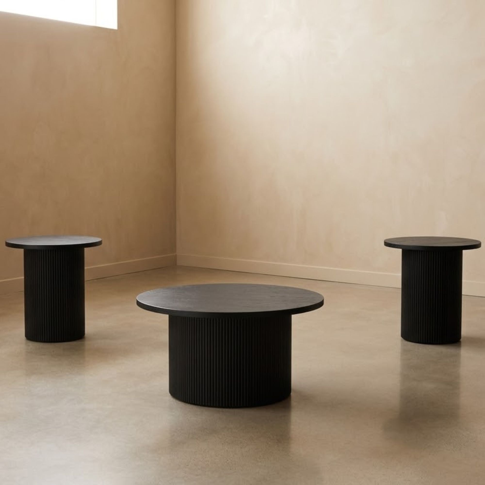 Black Harper 3-piece coffee table set by IFF featuring modern rectangular tables with sleek surfaces.