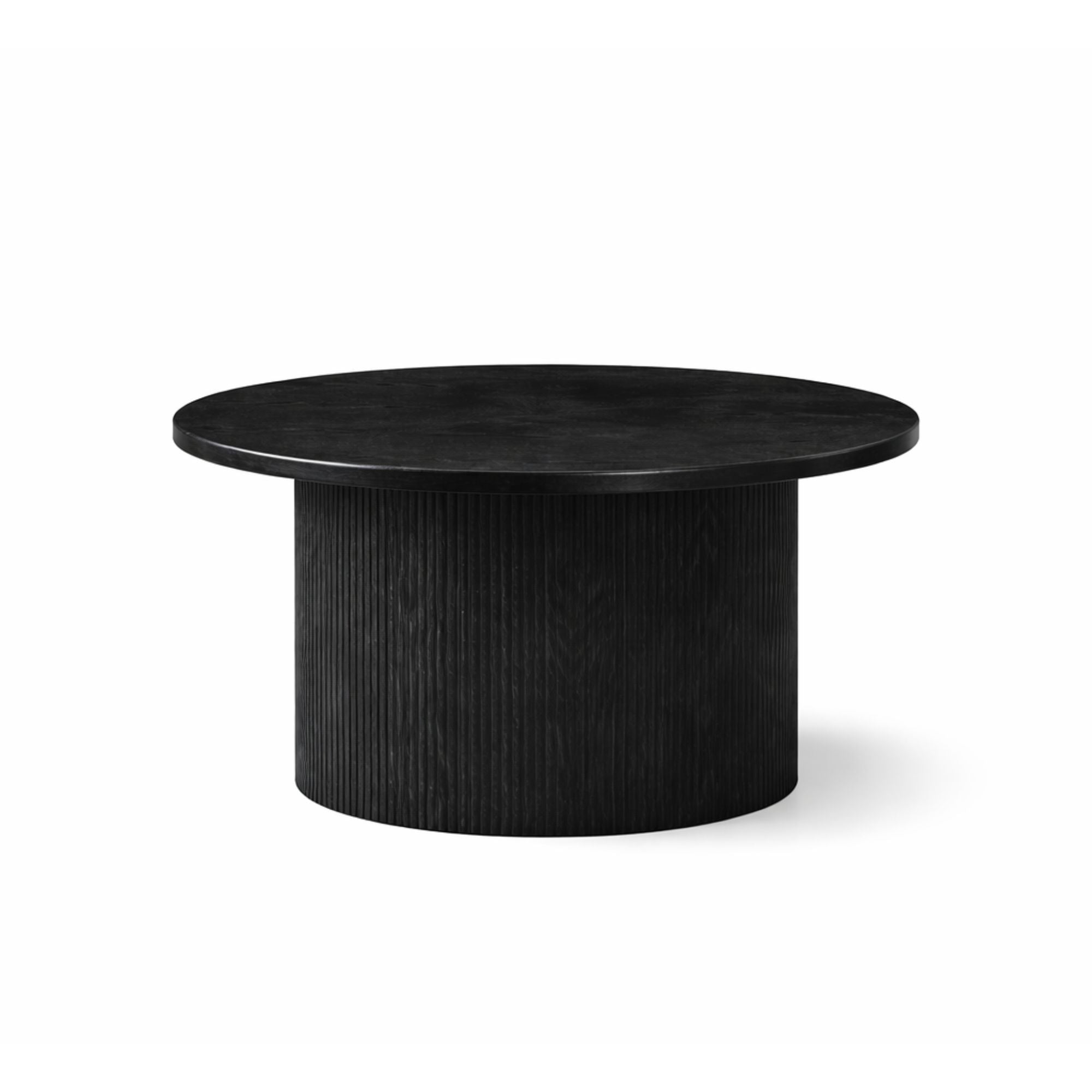 Set of three black Harper coffee tables from IFF, featuring modern design and clean lines in a stylish living room setting.