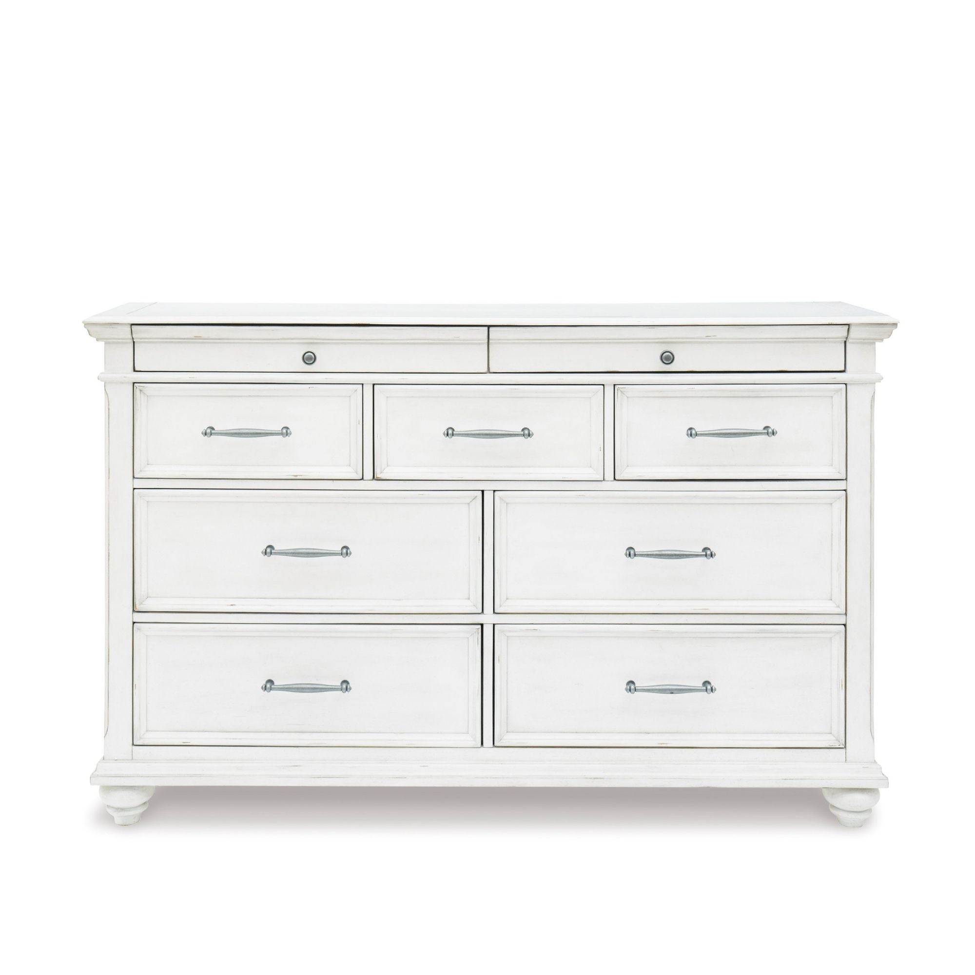 White Kanwyn dresser from Signature Ashley with sleek drawers, part of the modern bedroom furniture set.