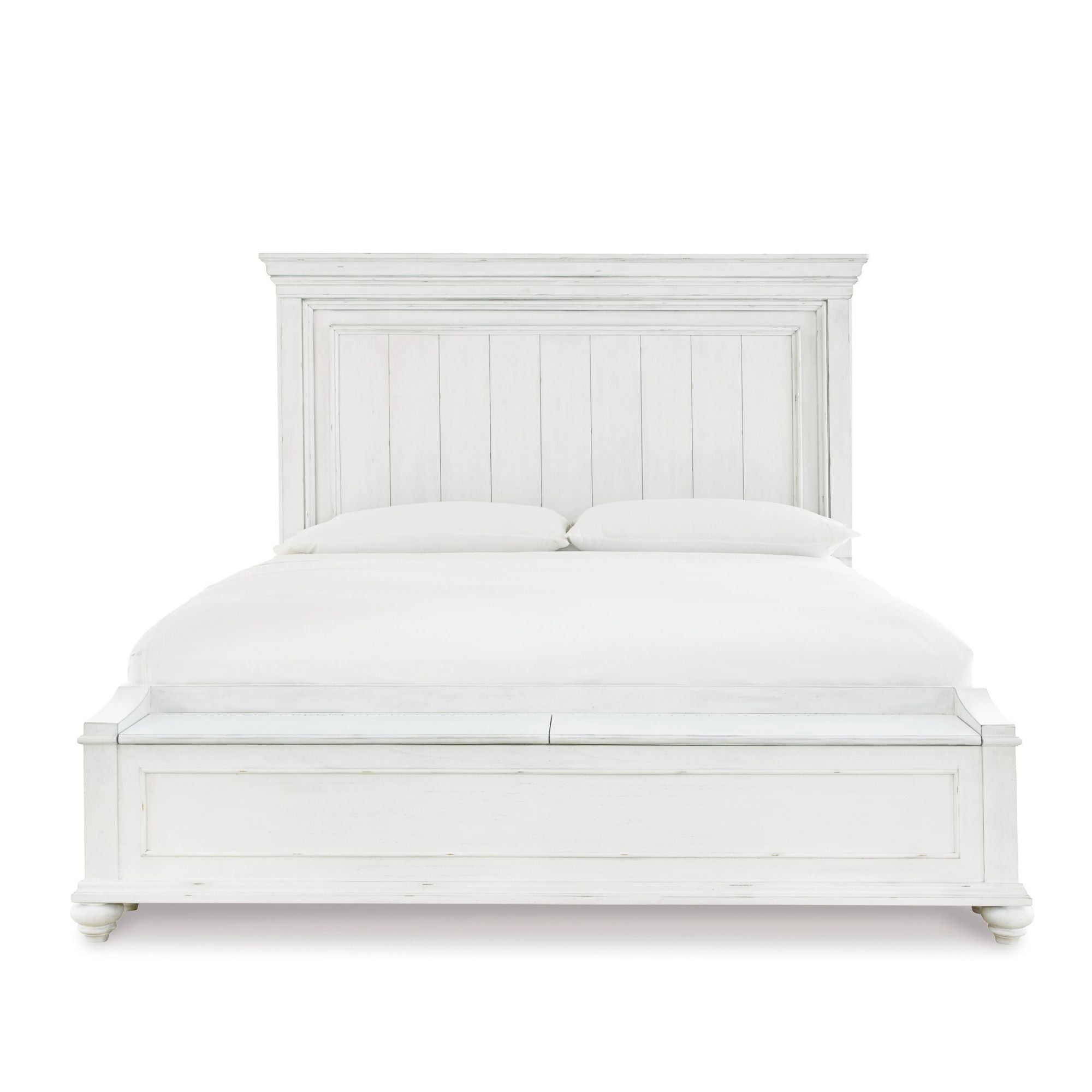 White Kanwyn Panel Bed by Signature Ashley with a sleek headboard and matching frame, shown in a modern bedroom setting.