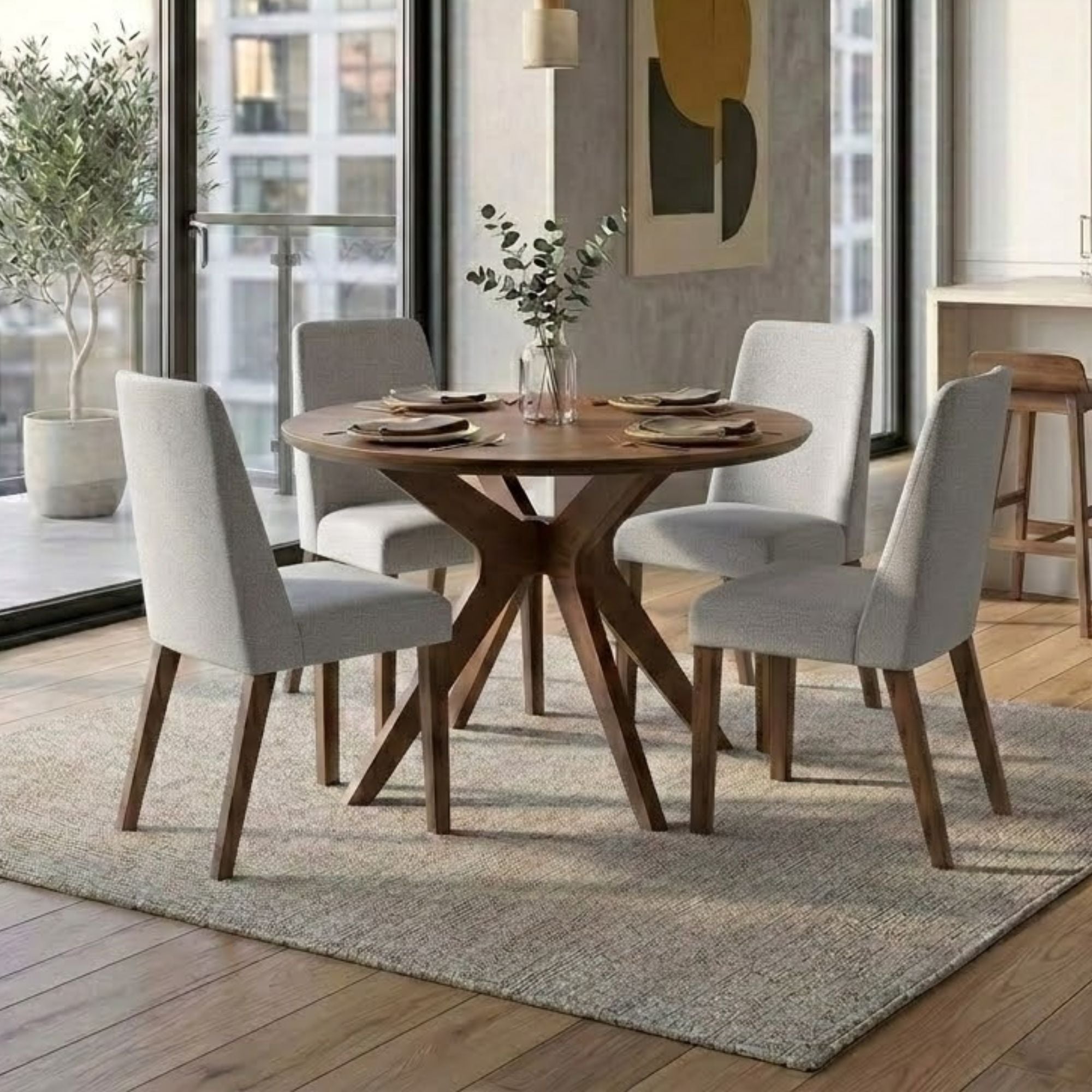 Round grey Lyncott collection dining table with matching chairs in a Signature Ashley dining room set.