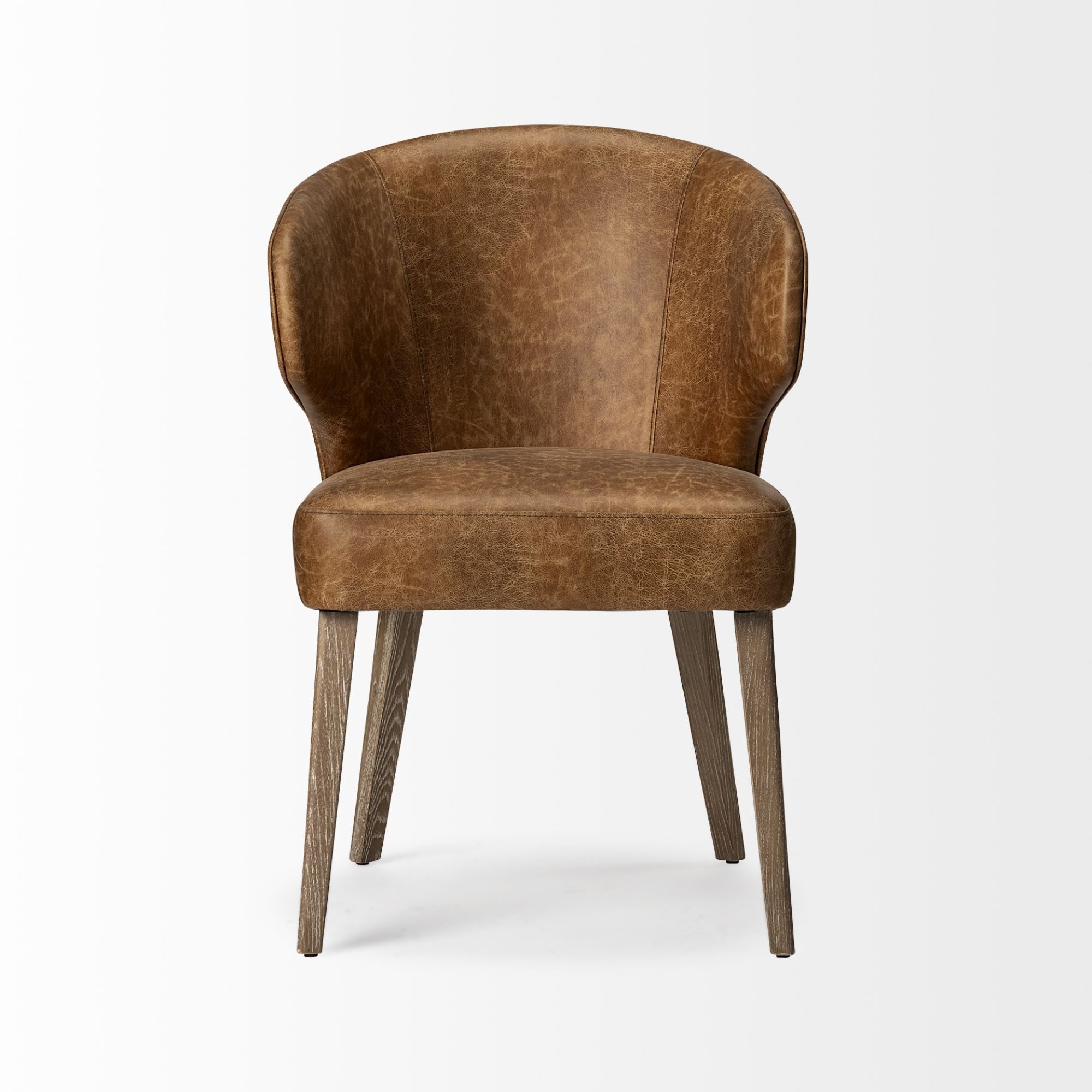 Niles faux leather dining chair by Mercana Furniture featuring a sleek modern design with cushioned seat and backrest.