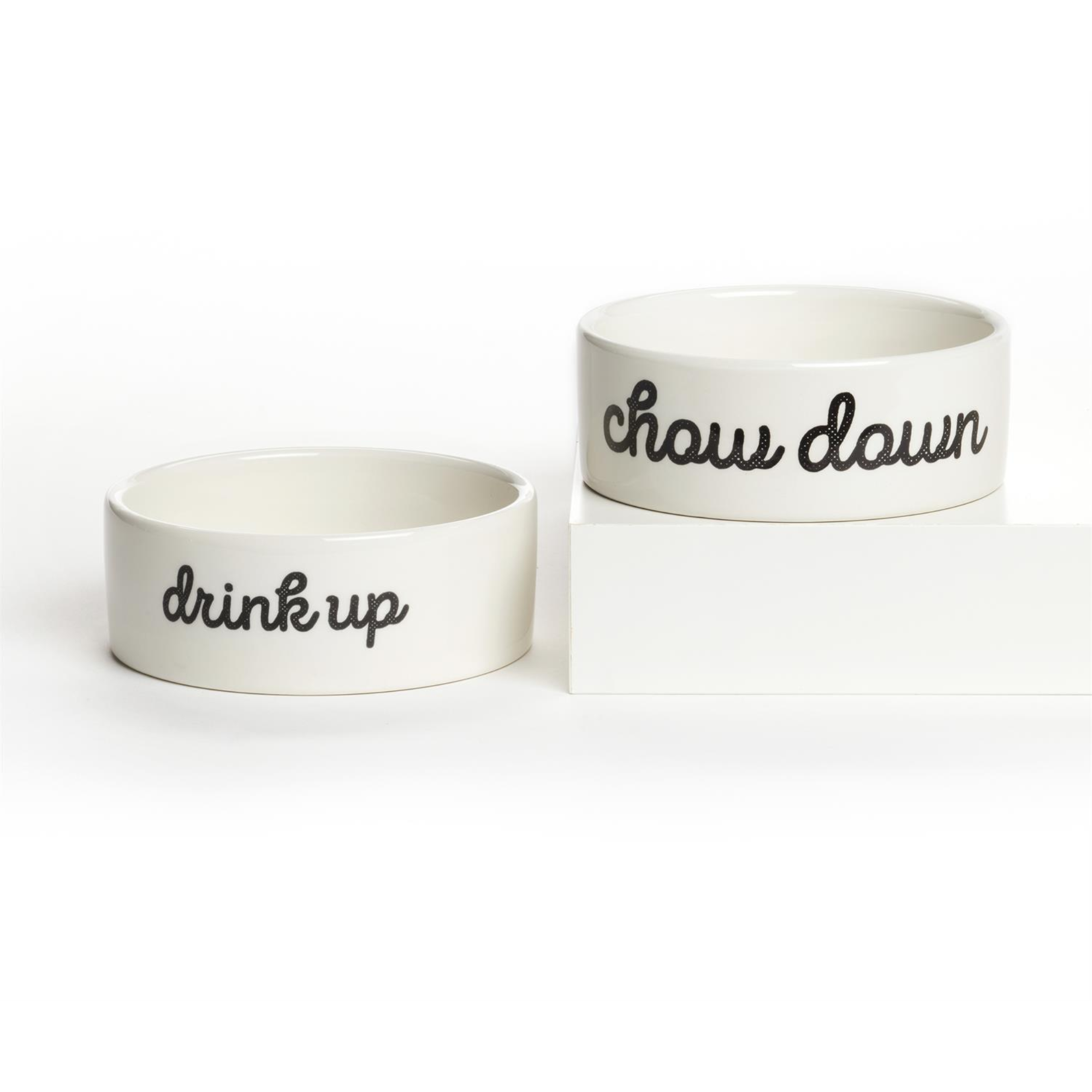 Pair of Maison decorative small pet bowls labeled “CHOW DOWN” and “DRINK UP” for food and water.