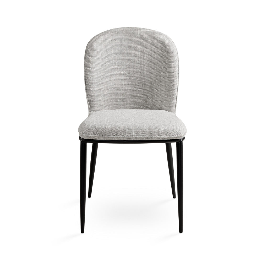 Set of two Xcella Angie Grey Dining Chairs with modern design, shown alongside a natural marble-top dining table.