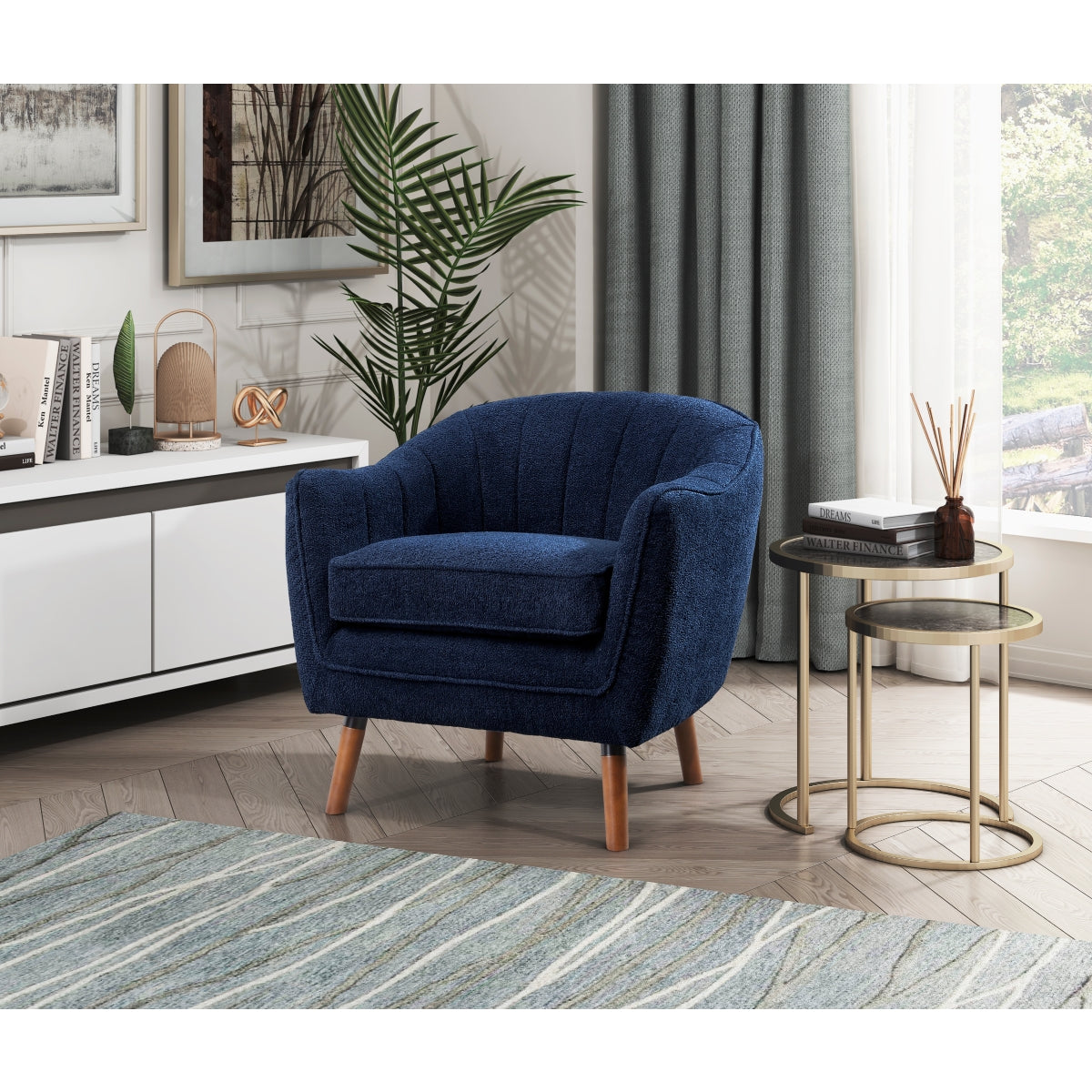 Blue MAZ Cutler Collection accent chair with plush upholstery and stylish wooden legs, perfect for modern living spaces.