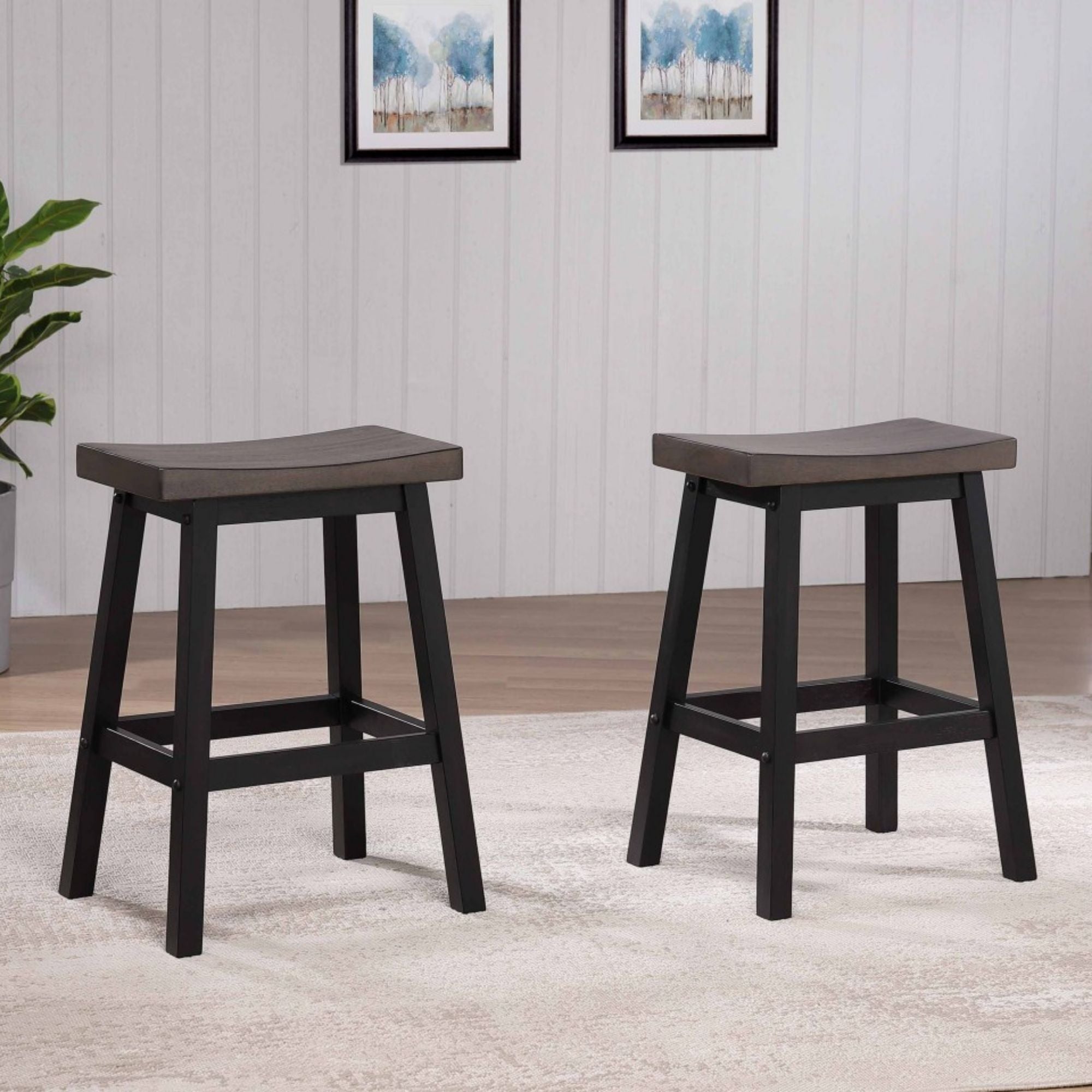 Set of two Brassex counter bar stools with oak wood seats and dark grey metal legs, modern and stylish for kitchen or bar area.