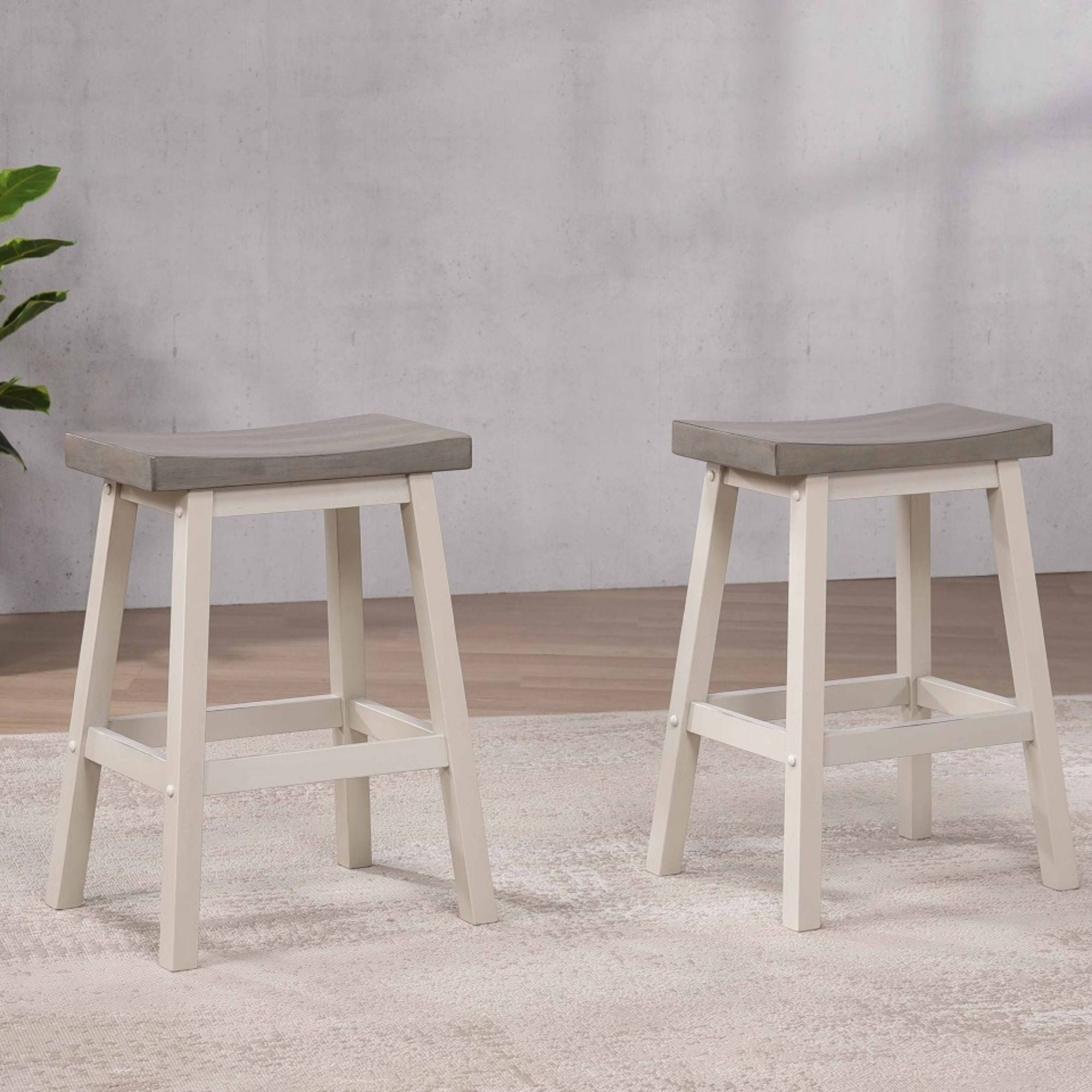 Pair of Brassex counter bar stools in grey and white, showcasing modern seating with sleek design and sturdy construction.