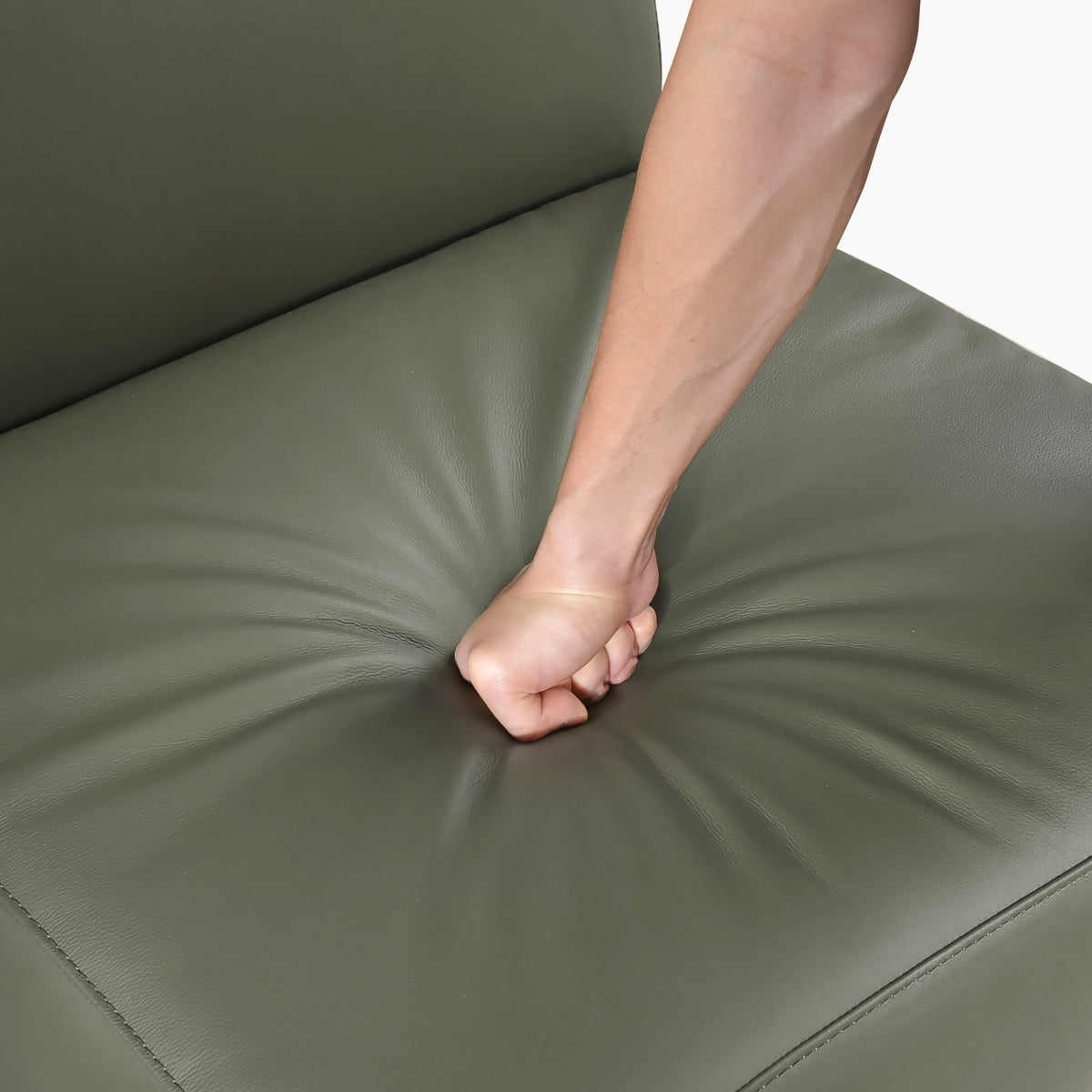 Close-up of MAZ Houghton Leather Accent Chair in green with detailed stitching and smooth leather upholstery.