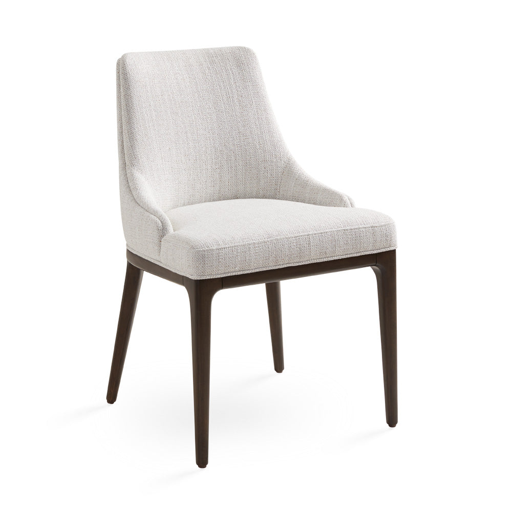 Xcella Everett dining chair in Brenton grey with a modern design, showcasing a comfortable upholstered seat and wooden legs.
