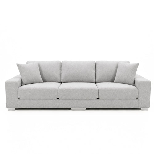 A light grey Canadian-made sofa with chrome legs, stylish and comfortable, from A.C. sofas collection.