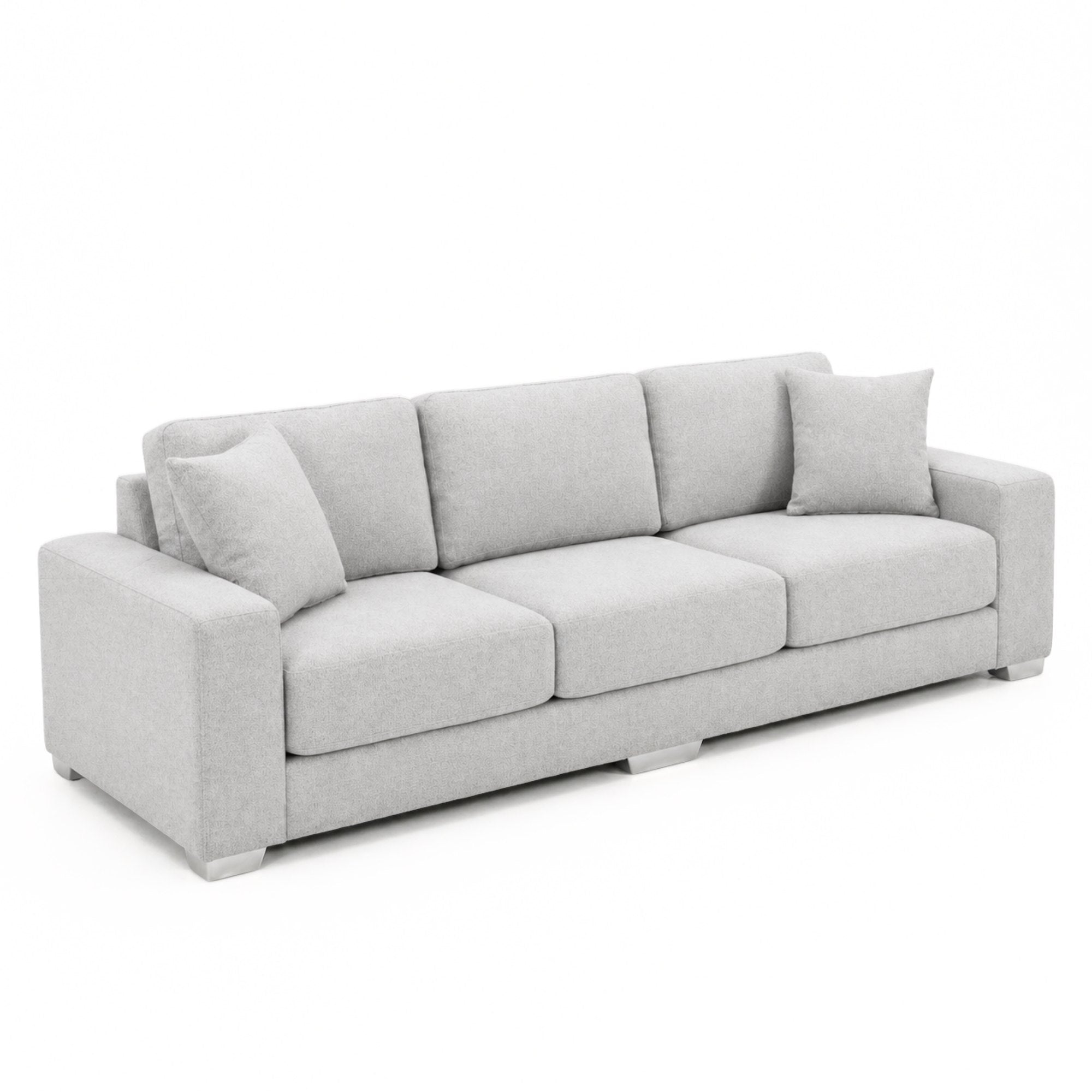 A light grey Canadian-made sofa with chrome legs from A.C., featuring a modern, sleek design and plush cushions.