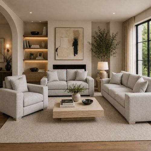 A.C. Canadian made light grey sofa set with chrome legs, featuring plush cushions and modern design.