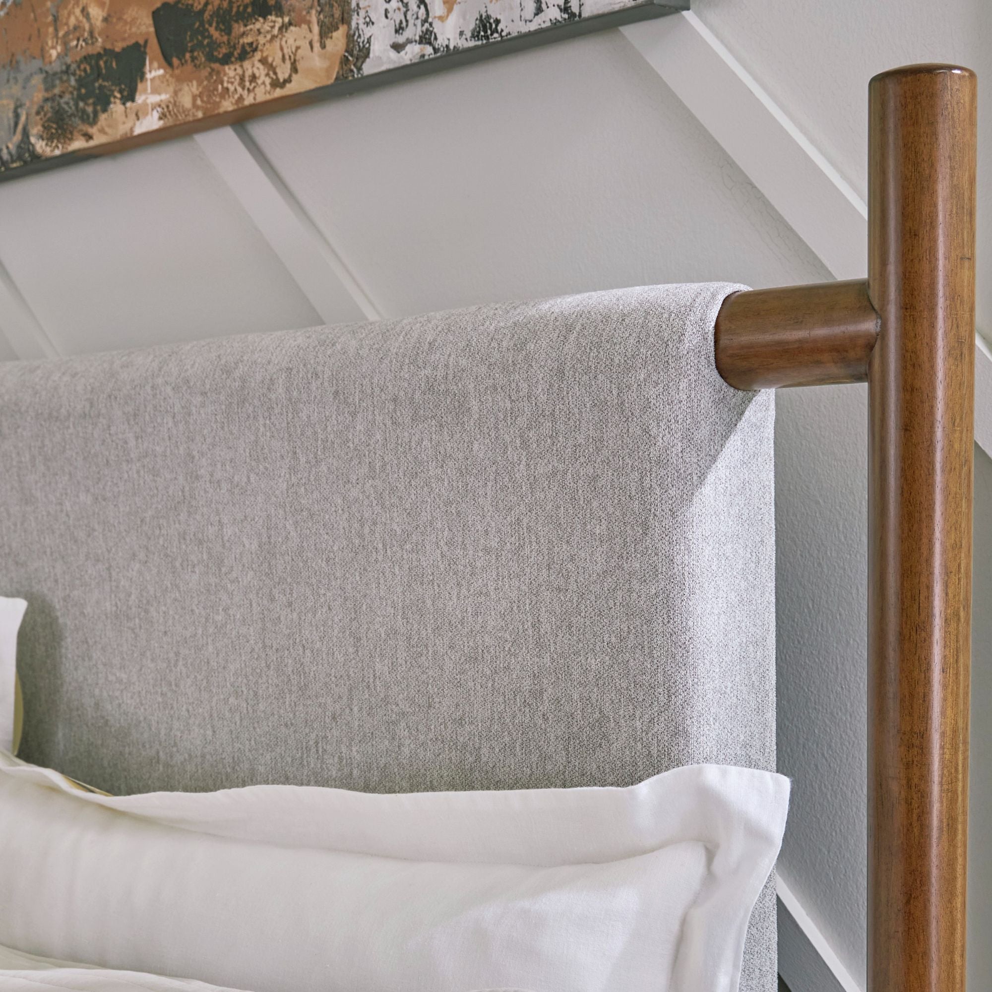 Signature Ashley Lyncott upholstered panel bed with padded headboard and sleek design for a modern bedroom look.