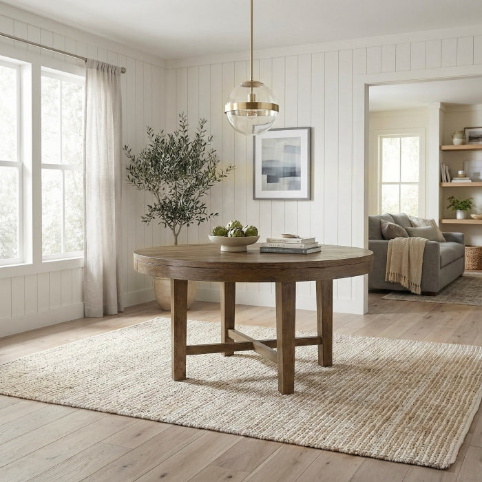 Side view of MAZ Matisse round dining table in a kitchen and dining room setting, showcasing its smooth wooden surface and sleek design.