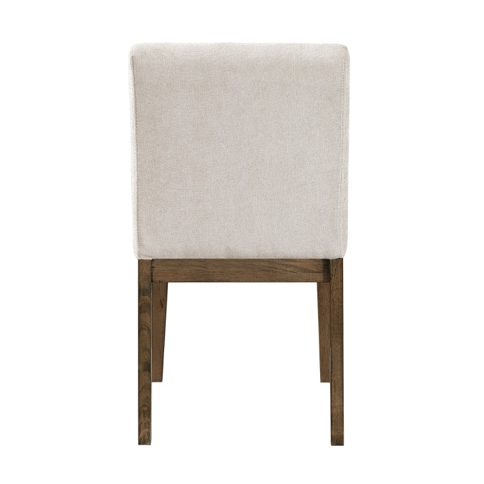 Back view of the MAZ Matisse Collection Extension Leaf Dining Room Set with wooden table and matching chairs, no background.