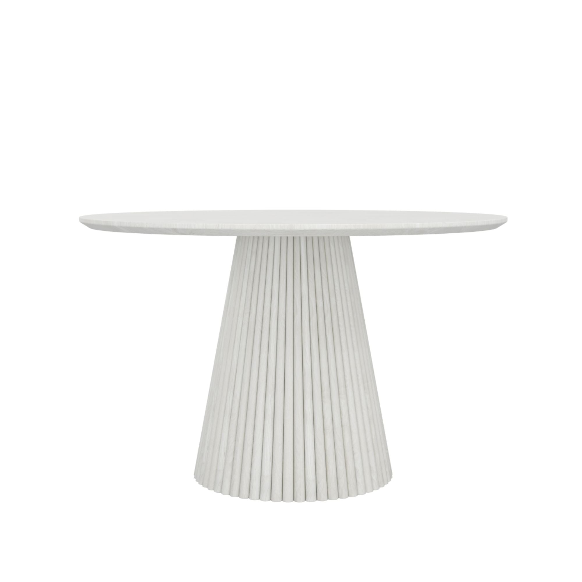 Brassex Akira wood dining table in white wash finish, showcasing a sleek rectangular design with sturdy wooden legs.