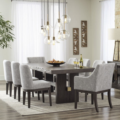 Signature Design by Ashley Burkhaus EXT dining room set with dark brown armchair, showcasing a modern wood dining table and matching chairs.