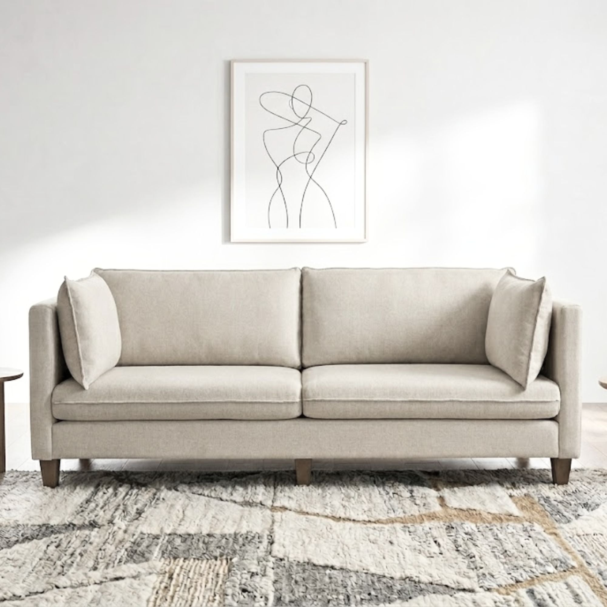 Canadian-made Calvin sofa by Statum Designs Inc, a stylish 3-seat sofa with plush cushions and modern design.