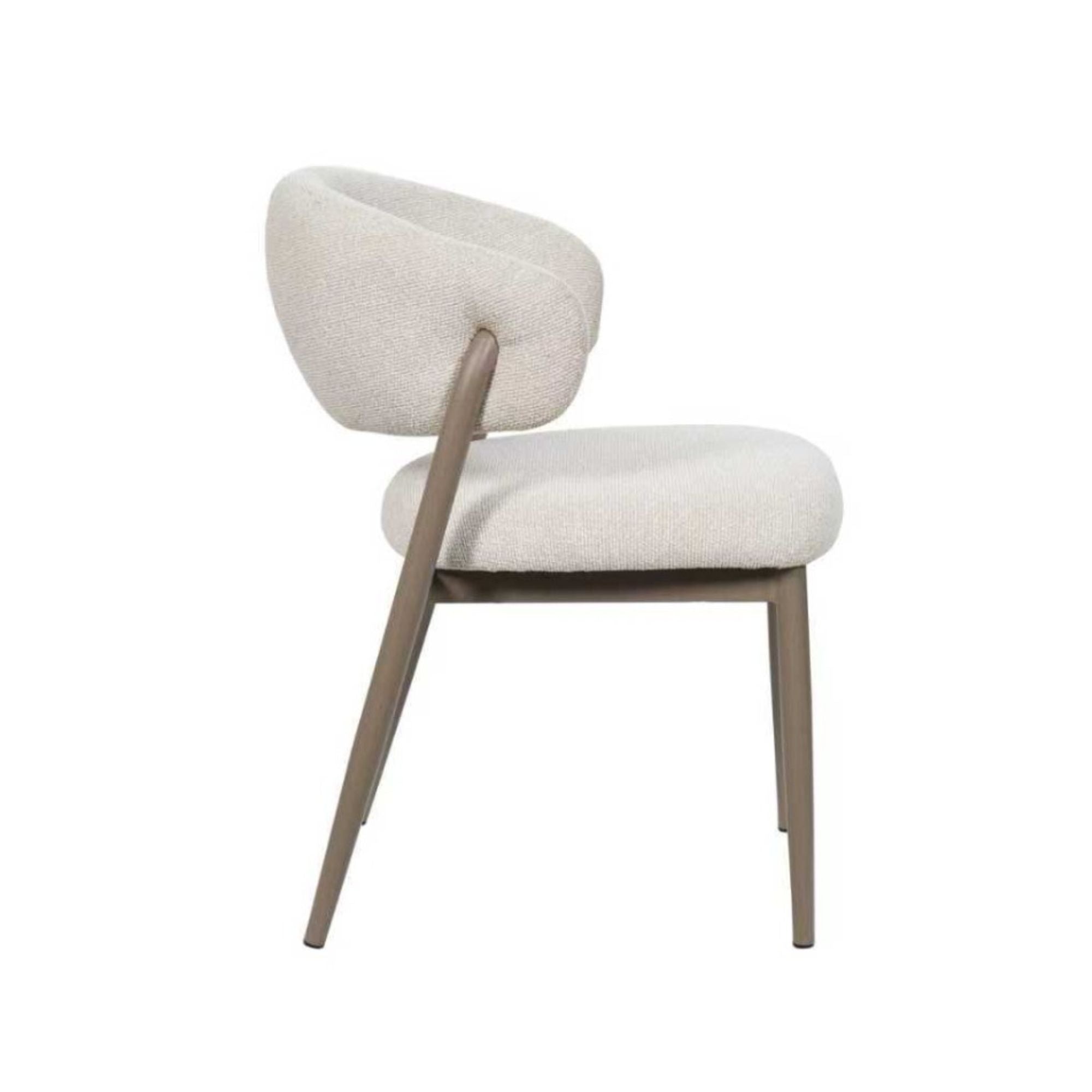 Pair of beige Brassex Linden dining chairs with wooden legs, shown from a side angle, set of two for modern kitchen or dining room.