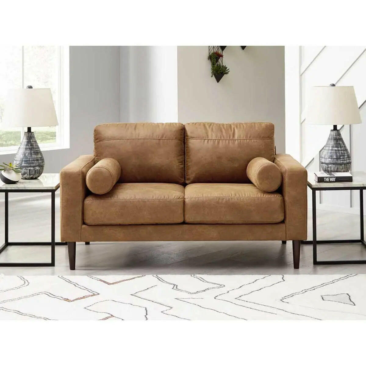 Ashley Telora caramel loveseat by Signature Design, showing plush fabric, sleek arms, and comfortable seating for cozy living rooms.