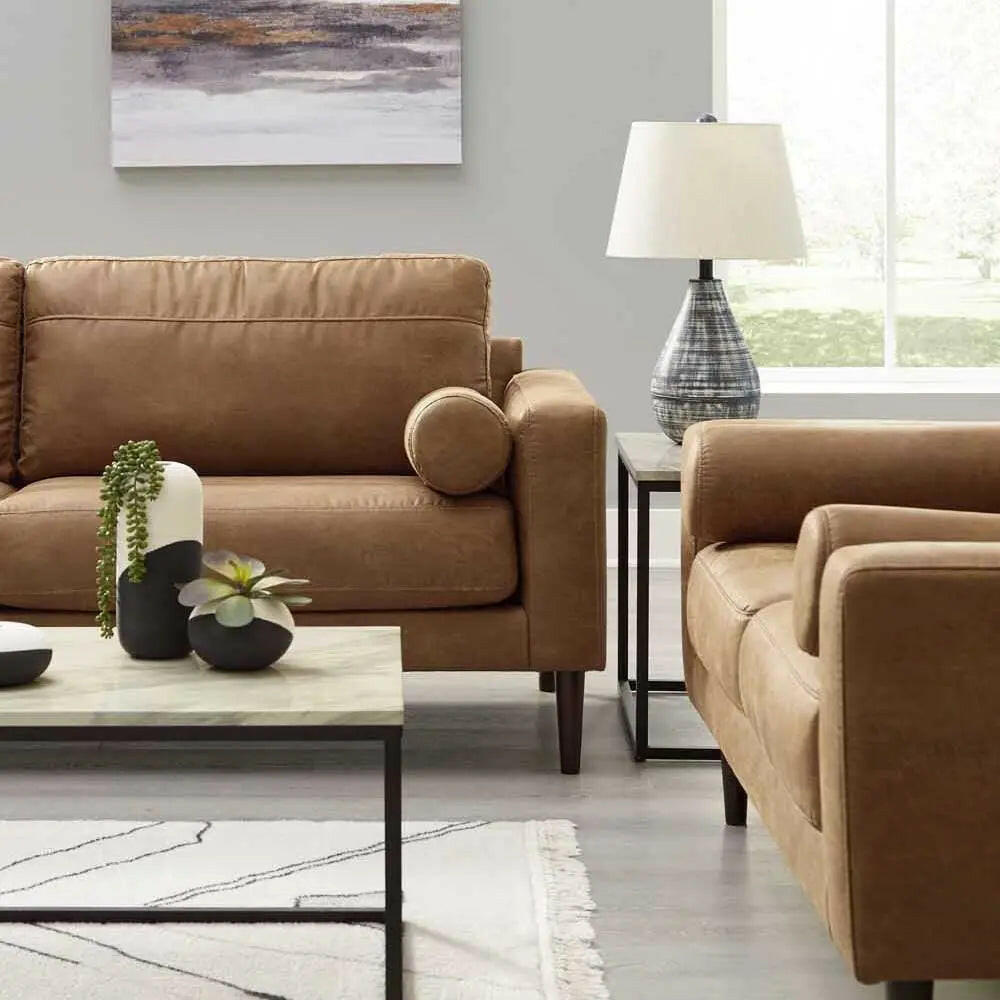 Ashley Telora Sofa In Caramel.