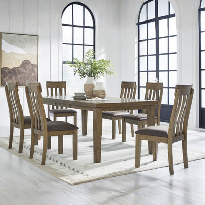 Light brown 7-piece Ashley dining room set with table and matching chairs, featuring a modern design and sturdy wood construction.