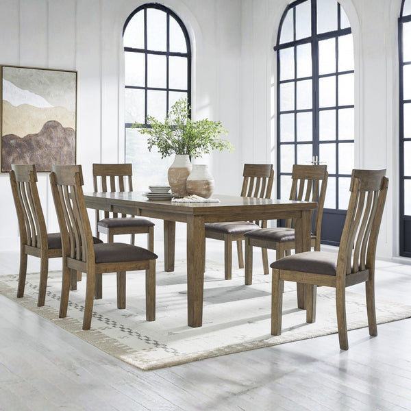 Light brown 7-piece Ashley dining room set with table and matching chairs, featuring a modern design and sturdy wood construction.