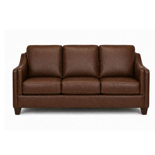 Brown Canadian-made leather match sofa with wood legs from A.C., showcasing a plush, comfortable seating area with a modern design.