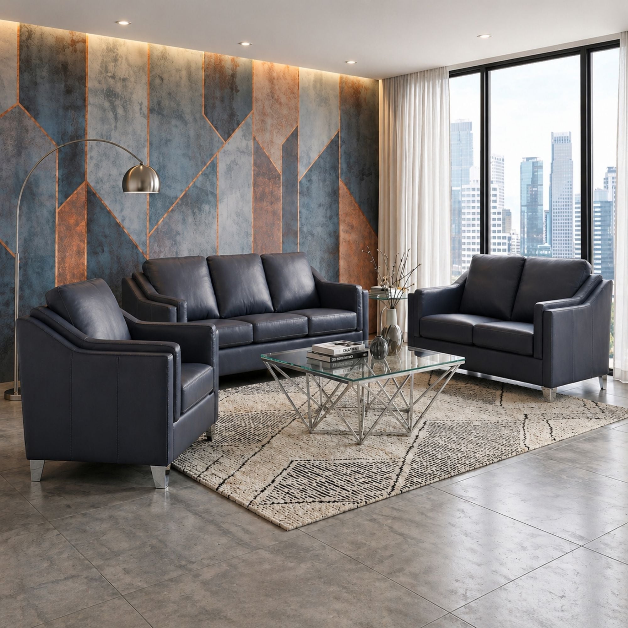 A.C. Canadian made leather match sofa with dark blue upholstery and chrome legs, showcasing a modern, comfortable seating option.