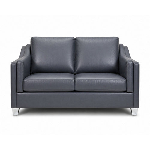Dark blue grey leather match loveseat with chrome legs by A.C., showcasing plush cushions and modern design.