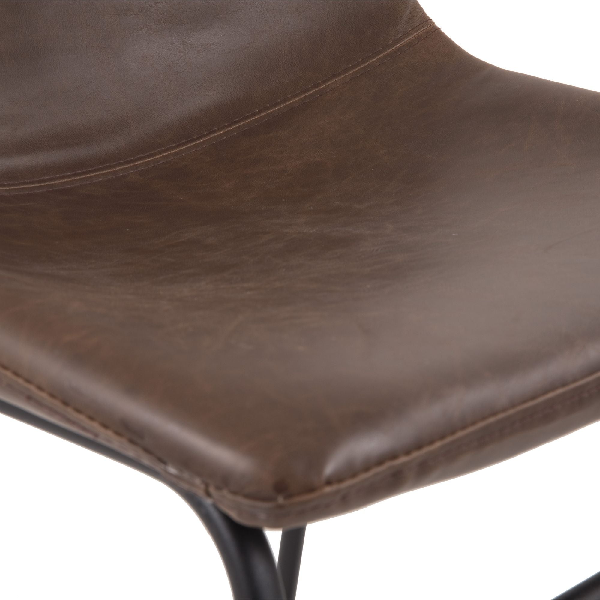 Set of two brown Centiar Dining UPH chairs by Signature Ashley, featuring sleek wooden legs and upholstered seats.