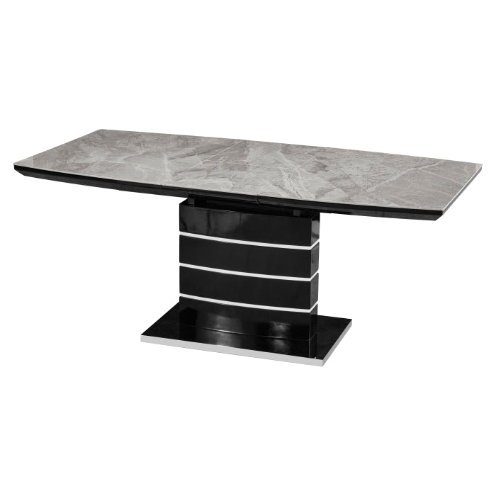 MAZ Glissand Sintered Stone extendable dining table in grey with a sleek, modern design, shown from a side angle.