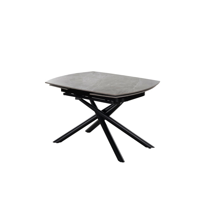 MAZ Crescent Sintered Stone Extending Dining Table shown with the leaf extension closed, angled view, no background.