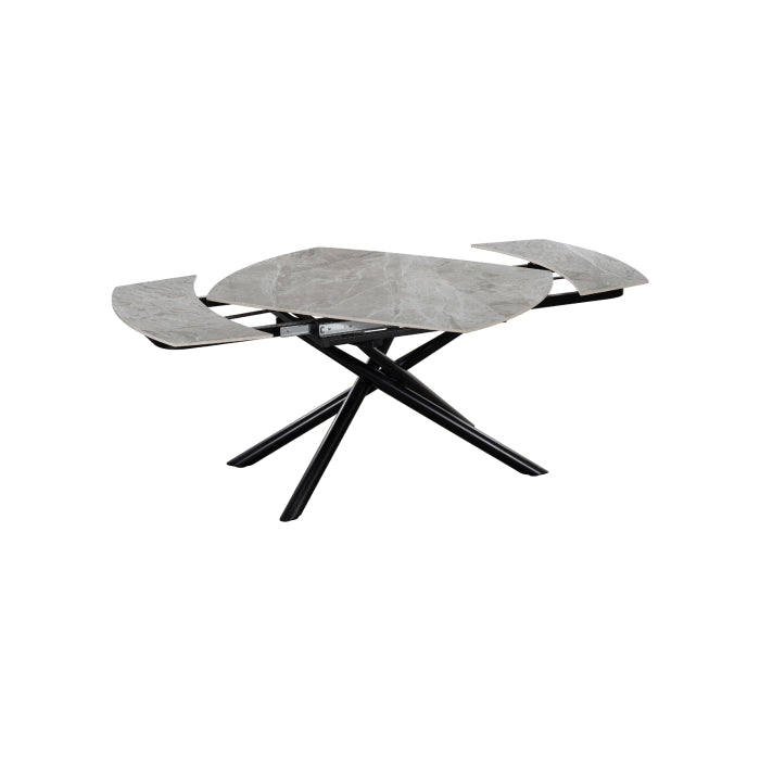 MAZ Crescent Sintered Stone Extending Dining Table with swivel extension shown from an angle, featuring a sleek modern design.