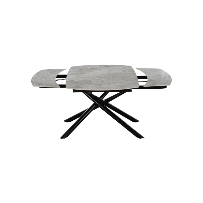 MAZ Crescent Sintered Stone Extending Dining Table with swiveling extension, showcasing a modern surface and sleek design.