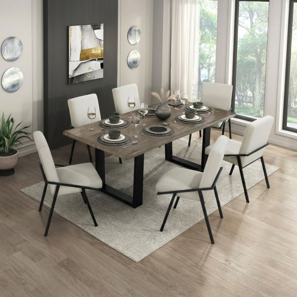 MAZ Rochelle Collection dining room set with a table and matching chairs in a modern design, perfect for contemporary dining spaces.