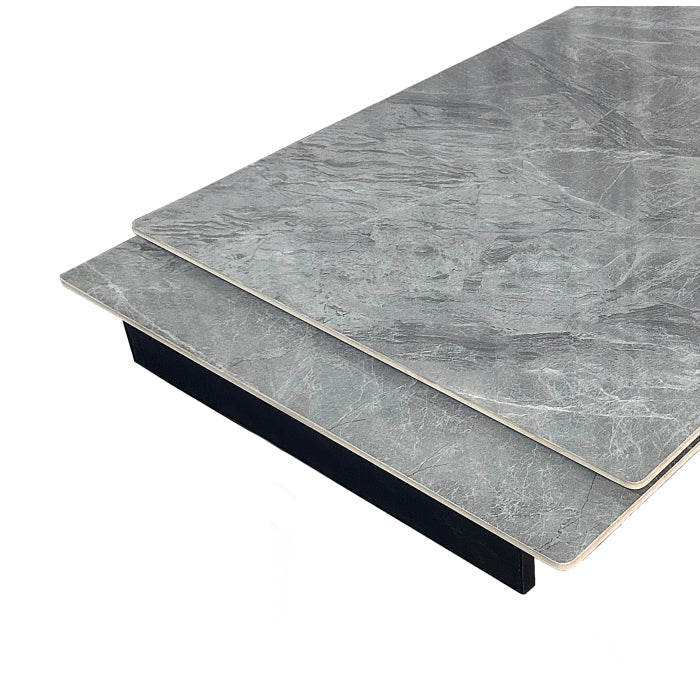 Close-up of the MAZ Colette Sintered Stone Extending Dining Table showing the detailed extension mechanism and sleek surface.