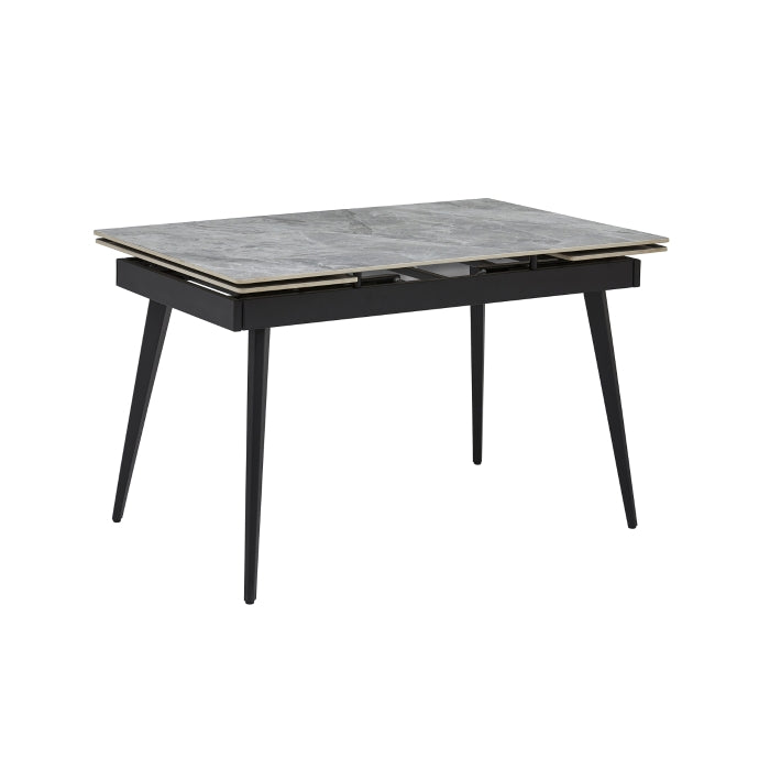 MAZ Colette Sintered Stone Extending Dining Table shown from an angled view, closed with no background visible.