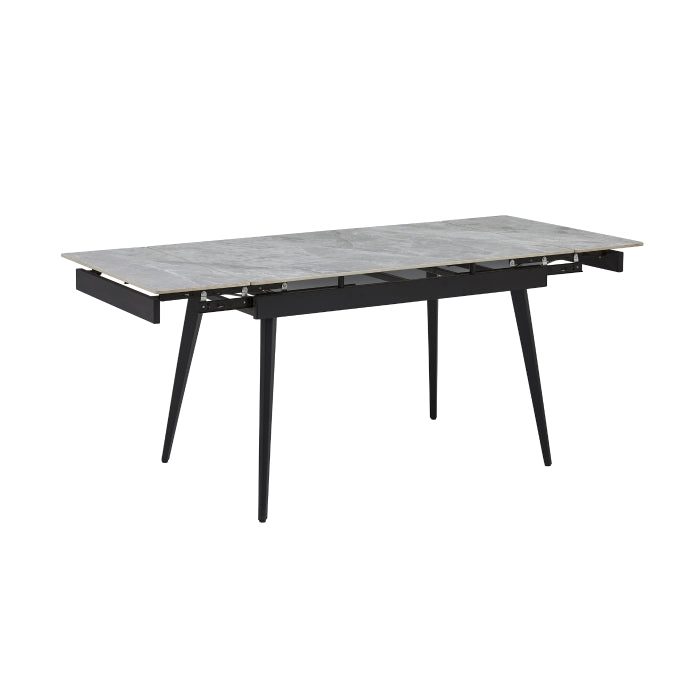 MAZ Colette Sintered Stone Extending Dining Table shown from an angle, featuring a sleek design and extended surface, no background.