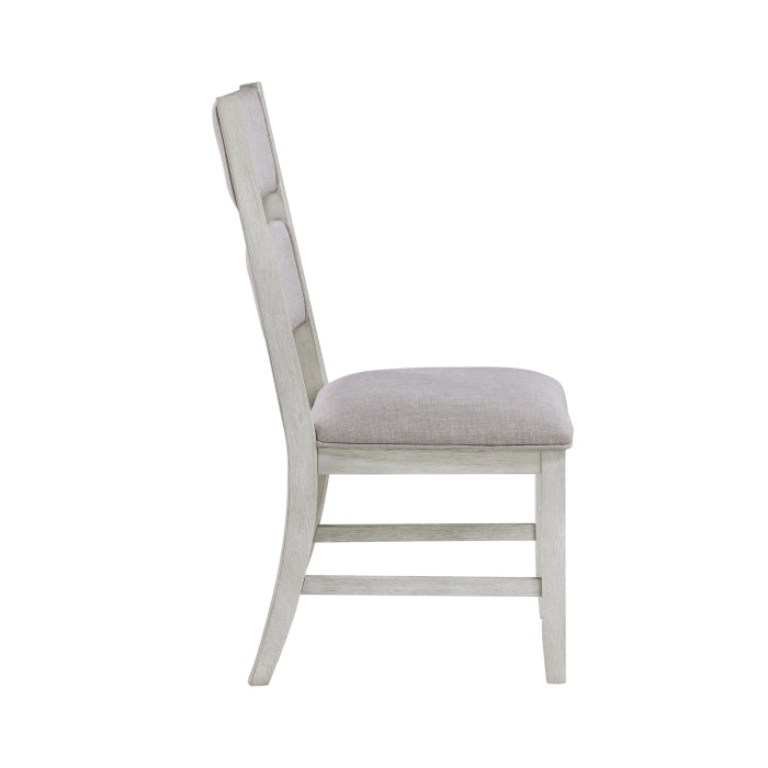 Side view of a MAZ Mason Collection 7-piece light grey dining room set with chairs and table, showcasing modern design.