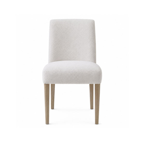 Light grey MAZ Bellwoods dining chair with cushioned seat and wooden legs, showcasing a modern and stylish design.