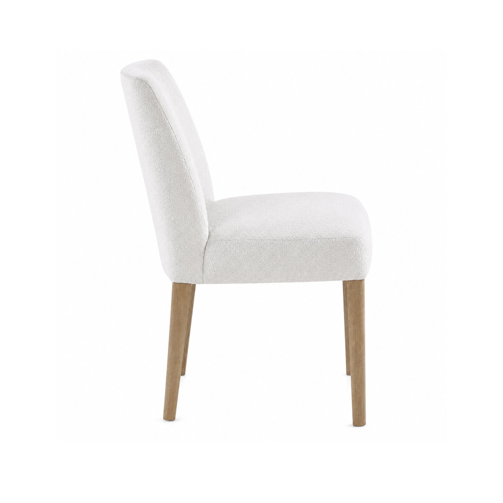 Light grey Bellwoods dining chair by MAZ, showcasing a sleek modern design with a comfortable upholstered seat and wooden legs.