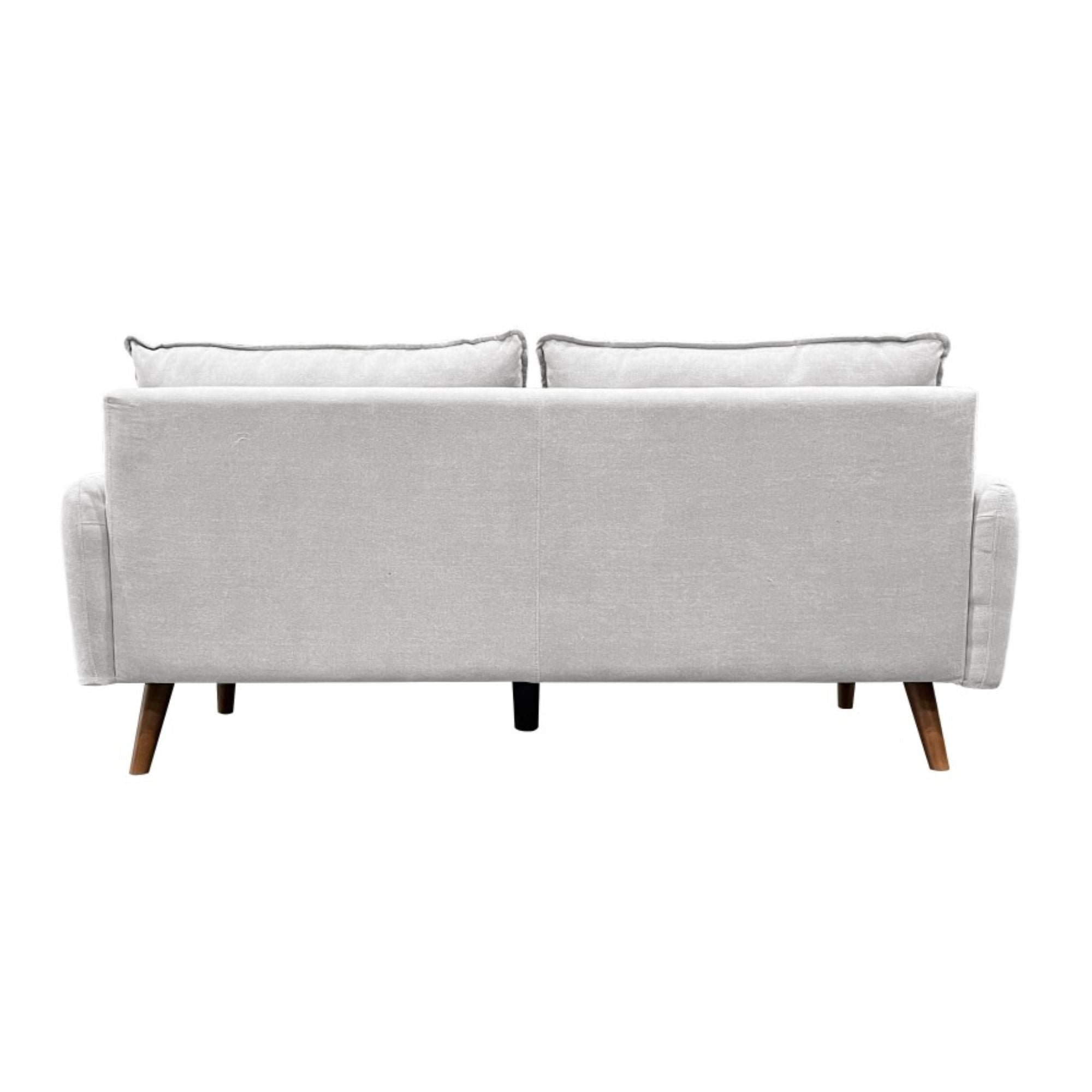 Light grey Ellison Seater sofa by Brassex, showcasing plush cushions and modern design in a living room setting.